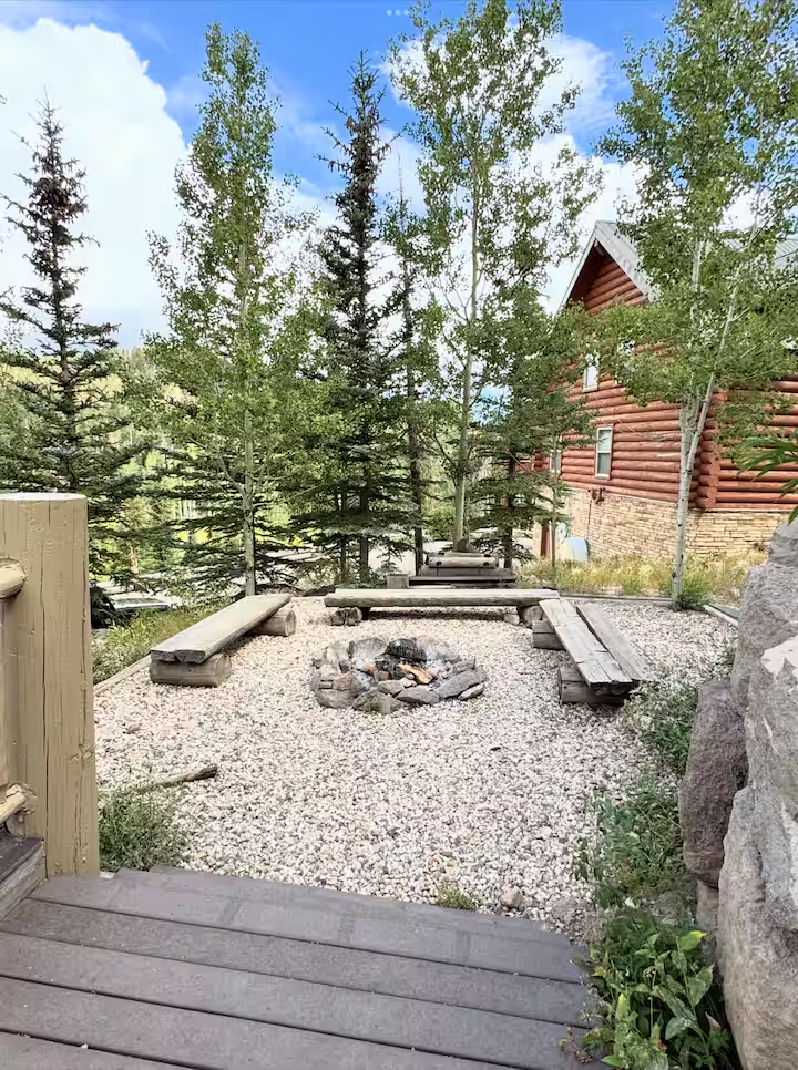 Summer surrounding scenery with fire pit and aspen trees
